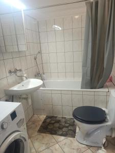 Koupelna v ubytování Apartamenty na skarpie