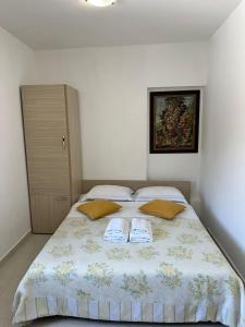 Filip Deluxe Rooms客房内的一张或多张床位