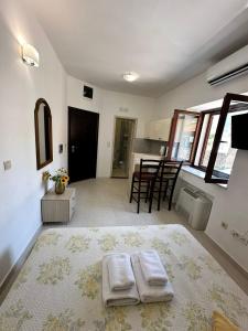 Filip Deluxe Rooms客房内的一张或多张床位