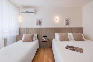 Postel nebo postele na pokoji v ubytování Granada Suites by Olala Homes
