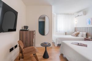 Postel nebo postele na pokoji v ubytování Granada Suites by Olala Homes