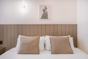 Postel nebo postele na pokoji v ubytování Granada Suites by Olala Homes
