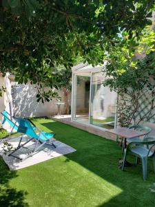 Κήπος έξω από το Sète centre - maison de vacances - 2 chambres - 4 personnes - 60 m2 avec parking gratuit privé, wifi et clim