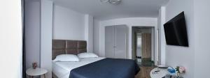 Μια τηλεόραση ή/και κέντρο ψυχαγωγίας στο Hotel Emma