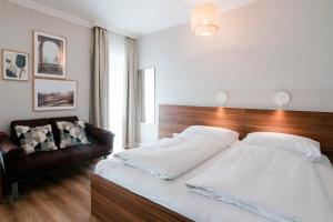 Postel nebo postele na pokoji v ubytování Hotel Villa Solln