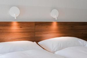 Postel nebo postele na pokoji v ubytování Hotel Villa Solln