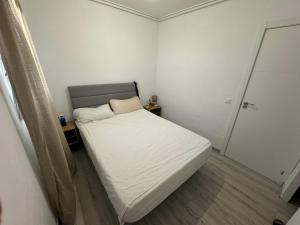 Postel nebo postele na pokoji v ubytování SuecaRoom