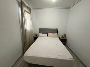 Postel nebo postele na pokoji v ubytování SuecaRoom