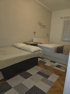 Ένα ή περισσότερα κρεβάτια σε δωμάτιο στο apartment Sandra 2+2 *** +22 φωτογραφίες