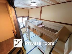 Voodi või voodid majutusasutuse Hostel Miyagawa by Murasaki toas