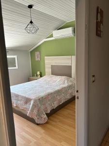 Postel nebo postele na pokoji v ubytování Quinta de Areias