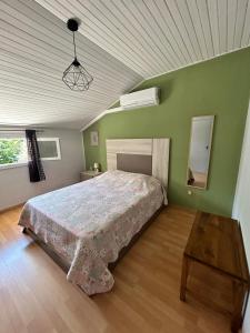 Postel nebo postele na pokoji v ubytování Quinta de Areias