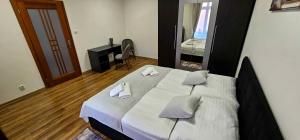 Posteľ alebo postele v izbe v ubytovaní Garni Hotel Tatramonti
