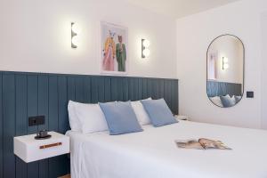 Postel nebo postele na pokoji v ubytování Granada Suites by Olala Homes