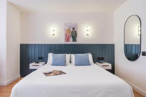 Postel nebo postele na pokoji v ubytování Granada Suites by Olala Homes