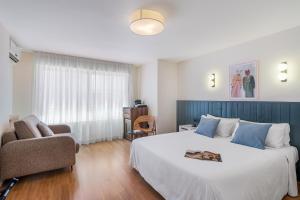 Postel nebo postele na pokoji v ubytování Granada Suites by Olala Homes