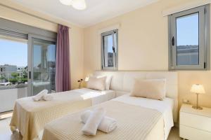 Postel nebo postele na pokoji v ubytování Villa Rodos Aphrodite by Villa Plus