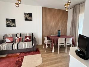 TV a/nebo společenská místnost v ubytování Blue Moon Penthouse
