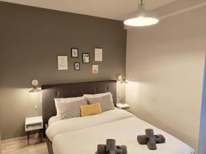 Ένα ή περισσότερα κρεβάτια σε δωμάτιο στο Your Pin -non- the rest