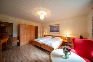Postel nebo postele na pokoji v ubytování Easy Stay by Hotel La Perla