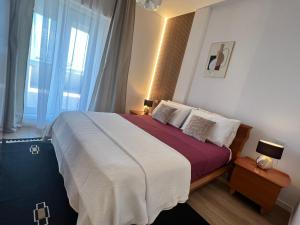 Postel nebo postele na pokoji v ubytování Blue Moon Penthouse