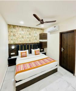 Voodi või voodid majutusasutuse Hotel GS Grand Amritsar toas