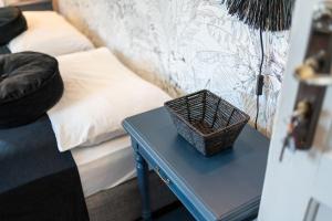 Postel nebo postele na pokoji v ubytování Easy Stay by Hotel La Perla