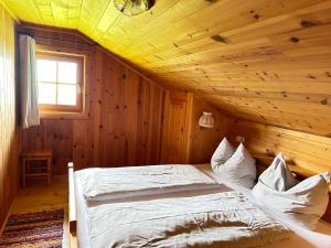 Ένα ή περισσότερα κρεβάτια σε δωμάτιο στο Ferienhaus Moosstadel +12 φωτογραφίες