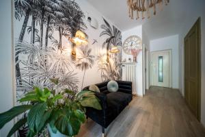 Posezení v ubytování Easy Stay by Hotel La Perla