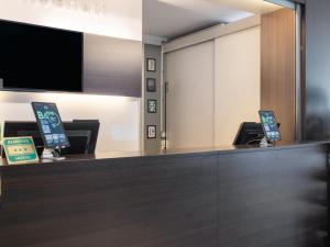 TV a/nebo společenská místnost v ubytování B&B HOTEL Mantova