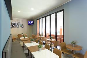 TV a/nebo společenská místnost v ubytování B&B Hotel Bergamo City