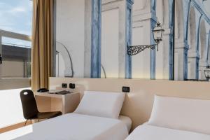 A seating area at B&B Hotel Firenze City Center