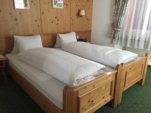 Voodi või voodid majutusasutuse Tamina Hotel toas