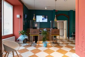 TV a/nebo společenská místnost v ubytování B&B Hotel Genova Principe