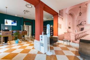 TV a/nebo společenská místnost v ubytování B&B Hotel Genova Principe