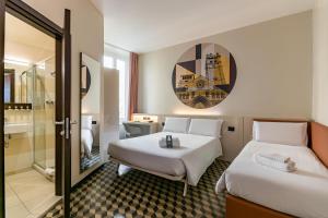 Postel nebo postele na pokoji v ubytování B&B Hotel Genova Principe