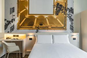Postel nebo postele na pokoji v ubytování B&B Hotel Genova Principe