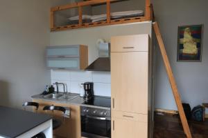 Η κουζίνα ή μικρή κουζίνα στο Centauren Apartment 03 Modern im Herzen Bremens