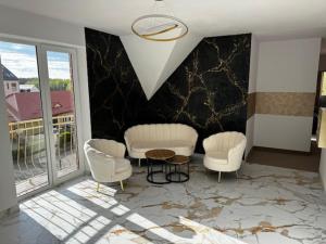 Posezení v ubytování BUTIK Hotel 350m od plaży