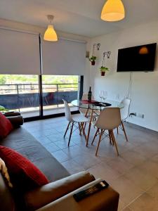 TV a/nebo společenská místnost v ubytování Departamento con increíble vista a la Cordillera