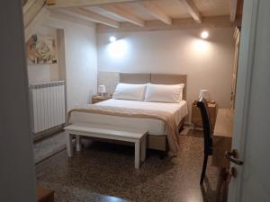 Postel nebo postele na pokoji v ubytování Lentisco B&B