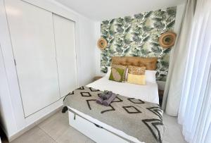 Postel nebo postele na pokoji v ubytování Caramel Cookie con Piscina, Doble terraza, Parking y WIFI + 22 fotografií