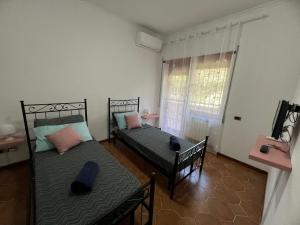 Ένα ή περισσότερα κρεβάτια σε δωμάτιο στο Paki House Luxury