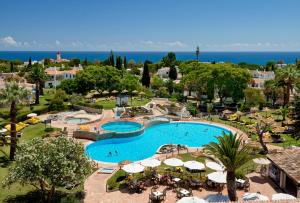 an aerial view of a resort with a swimming pool at Rocha Brava Village Resort in Carvoeiro