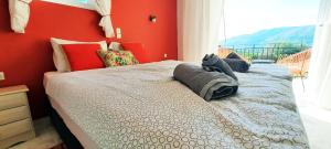 Posteľ alebo postele v izbe v ubytovaní ILEKTRA Apartments Blue & Red