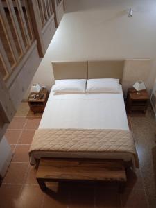 Postel nebo postele na pokoji v ubytování Lentisco B&B