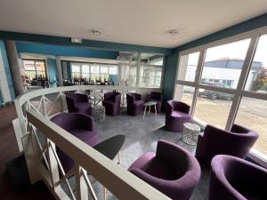 Posezení v ubytování BRIT HOTEL LE VESOUL