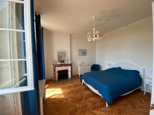 Postel nebo postele na pokoji v ubytování Maison de charme au cœur du vignoble médocain avec un Spa