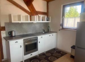 Η κουζίνα ή μικρή κουζίνα στο Ferienwohnung Häsenbühlhof