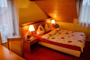 Rúm í herbergi á Auberge Communale à l'Union